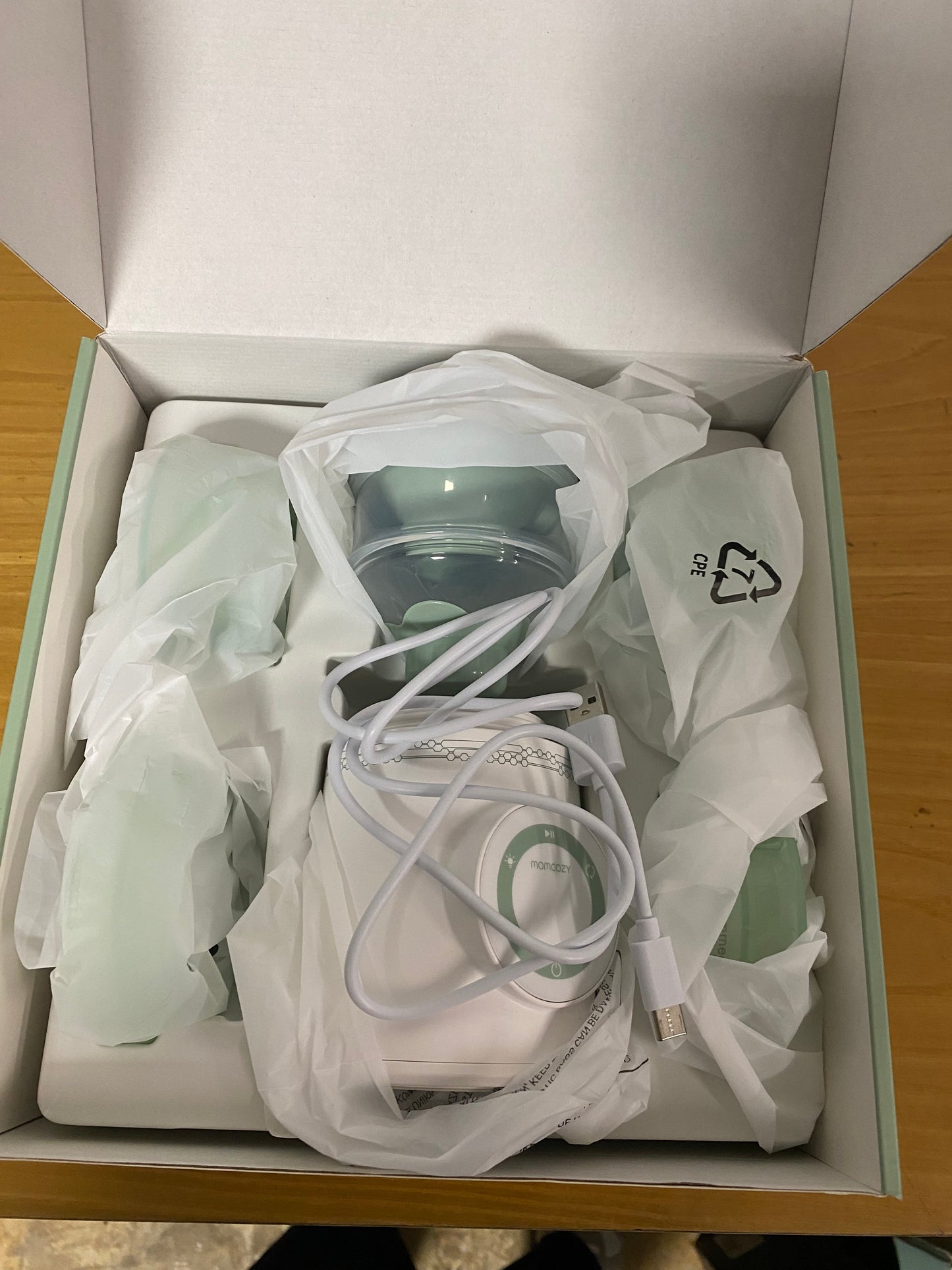 Calentador de biberones portátil Momcozy