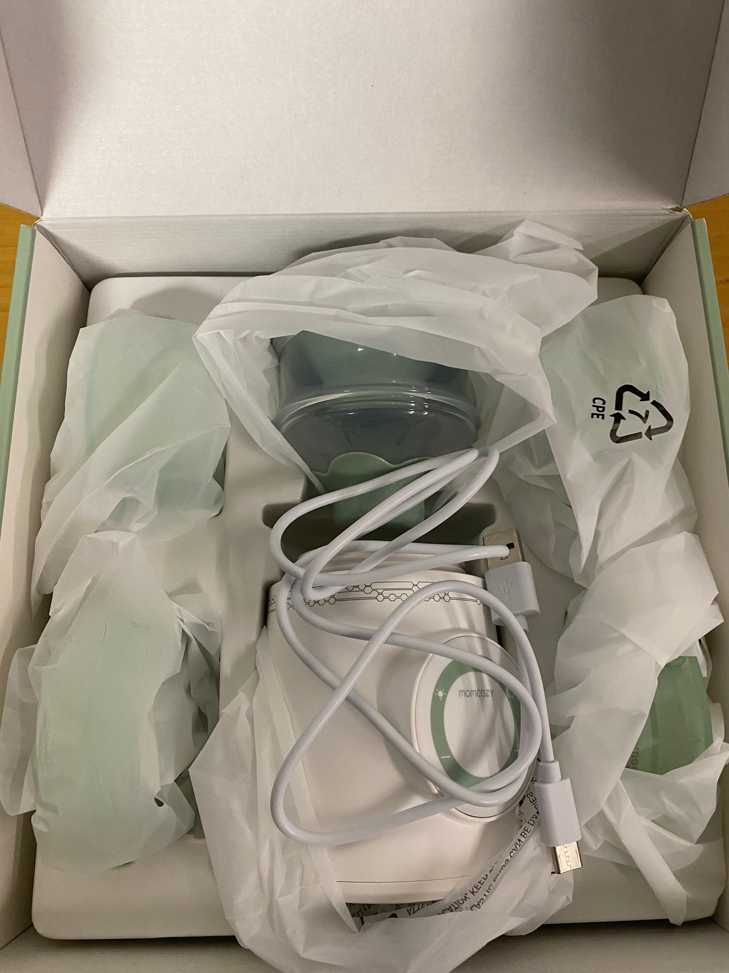 Calentador de biberones portátil Momcozy